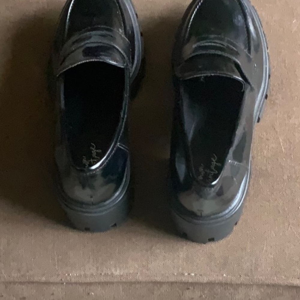 Black wedge loafer style shoes